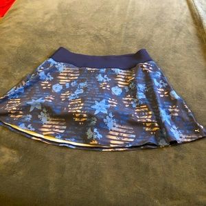 Puma mostly navy blue touch of light blue hint of peach, golf/tennis skort, XL